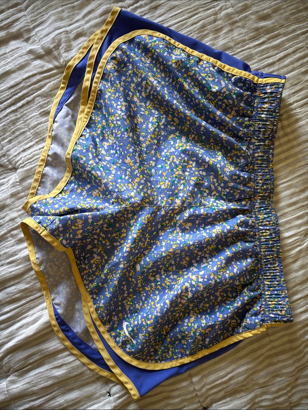 Nike Blue Floral Athletic Shorts with Yellow Trim